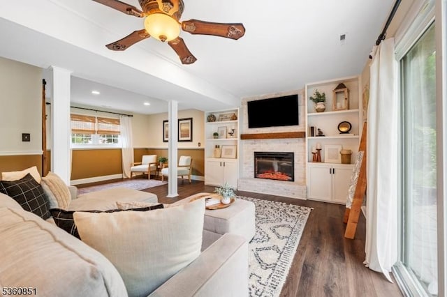 39 Fox Chase Run, Hillsborough Twp, NJ 08844 - living room with dark wood-style flooring, a brick fireplace, ceiling fan, baseboards, and recessed lighting