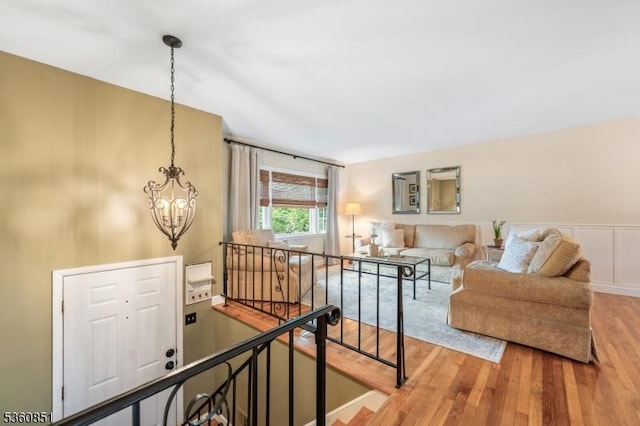39 Fox Chase Run, Hillsborough Twp, NJ 08844 - living area featuring wood finished floors and a chandelier
