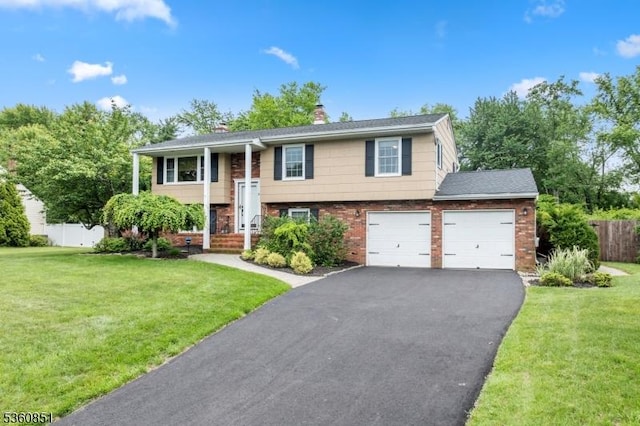 39 Fox Chase Run, Hillsborough Twp, NJ 08844 - split foyer home with asphalt driveway, a chimney, brick siding, and a garage