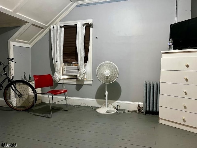 654 E 26th St, Paterson City, NJ 07504 - living area with radiator heating unit, hardwood / wood-style flooring, baseboards, vaulted ceiling, and cooling unit