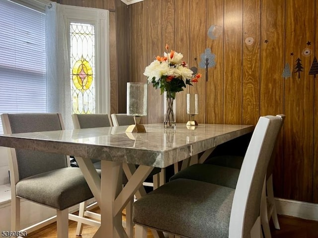 654 E 26th St, Paterson City, NJ 07504 - dining room featuring wooden walls