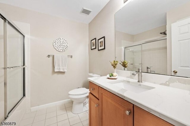25 Kennedy Ct, Montgomery Twp, NJ 08540 - bathroom featuring toilet, tile patterned flooring, vanity, baseboards, and shower / bath combination with glass door