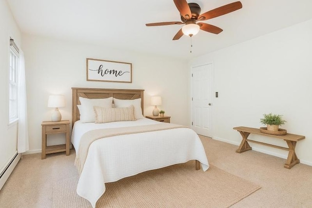 20 Woodland Trl, Sparta Twp, NJ 07871 - bedroom with a baseboard radiator, light carpet, ceiling fan, and baseboards