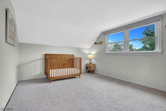 51 Hoffman Ave, Parsippany-Troy Hills Twp, NJ 07034 - carpeted bedroom featuring lofted ceiling, baseboards, and a nursery area