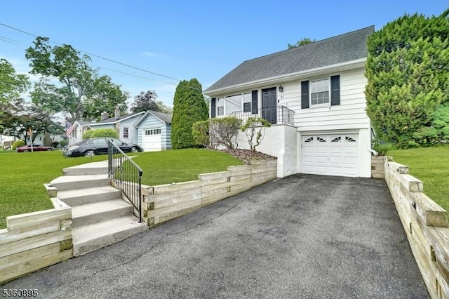 51 Hoffman Ave, Parsippany-Troy Hills Twp, NJ 07034 - view of front facade with driveway, a front yard, an attached garage, and roof with shingles