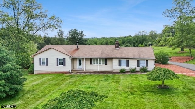 16 Hogback Rd, Franklin Twp, NJ 08867 - single story home featuring a front yard, a chimney, and covered porch