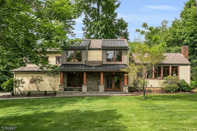 34 Keats Rd, Bernards Twp, NJ 07920 - view of front of home featuring a standing seam roof, french doors, a front yard, and covered porch