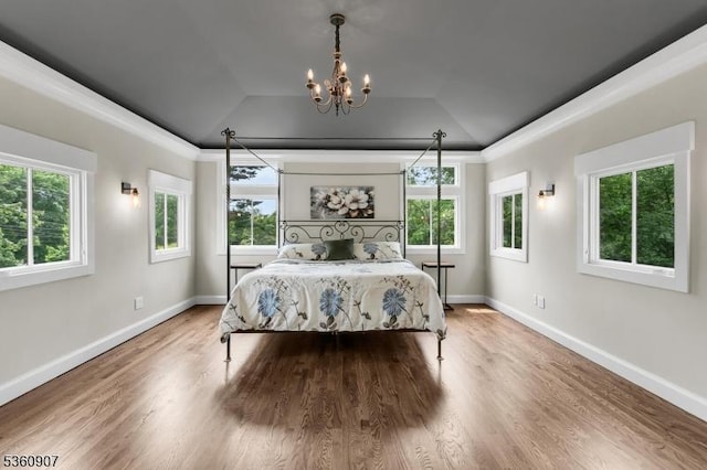 34 Keats Rd, Bernards Twp, NJ 07920 - bedroom with multiple windows, a chandelier, wood finished floors, lofted ceiling, and baseboards