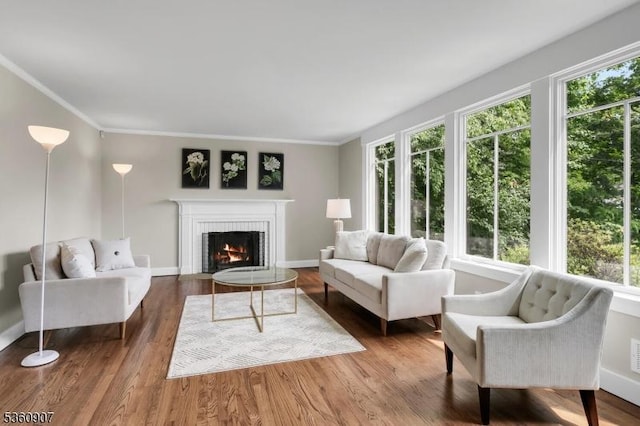 34 Keats Rd, Bernards Twp, NJ 07920 - living room with a fireplace, wood finished floors, ornamental molding, and baseboards