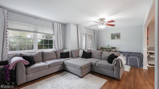 1106 Tudor Ct, Hillsborough Twp, NJ 08844 - living area with healthy amount of natural light, a ceiling fan, and wood finished floors