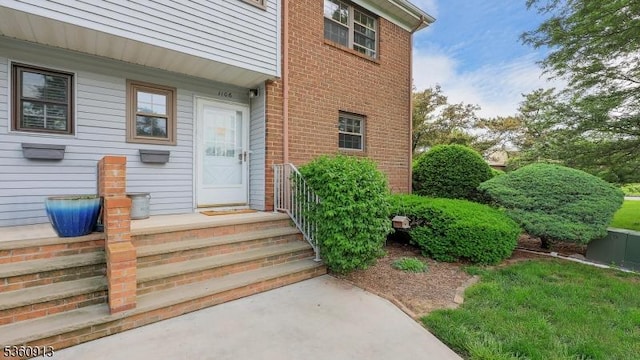 1106 Tudor Ct, Hillsborough Twp, NJ 08844 - view of exterior entry with brick siding