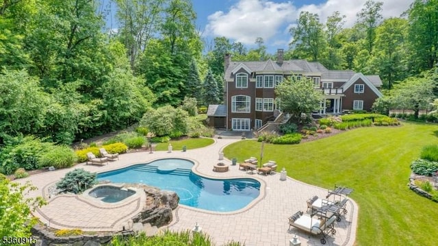 10 Van Kirk Pl, Sparta Twp, NJ 07871 - outdoor pool with an in-ground hot tub, a lawn, stairs, and a patio