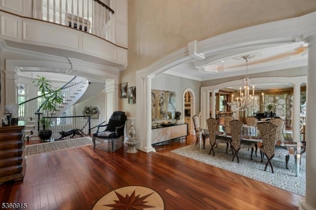 10 Van Kirk Pl, Sparta Twp, NJ 07871 - dining area featuring decorative columns, healthy amount of natural light, hardwood / wood-style floors, and crown molding