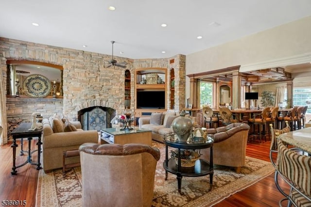 10 Van Kirk Pl, Sparta Twp, NJ 07871 - living room with recessed lighting, a stone fireplace, and wood finished floors