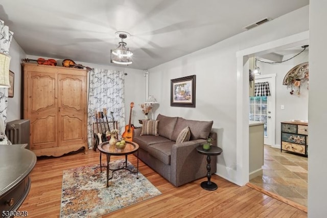 2 Broad St, Stockton Boro, NJ 08559 - living area featuring light wood-style floors and radiator heating unit