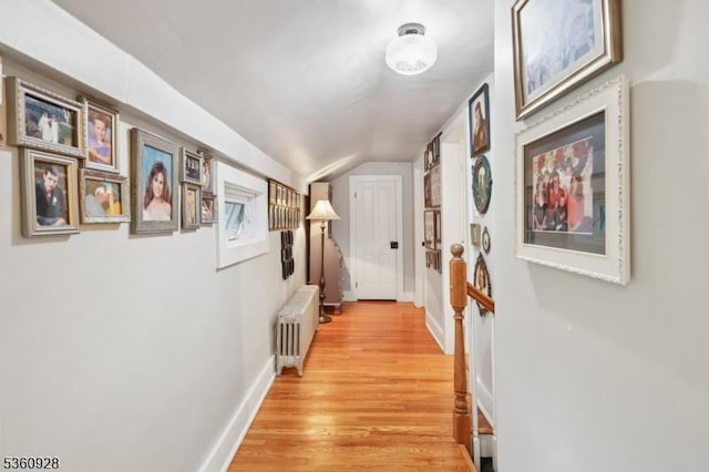 2 Broad St, Stockton Boro, NJ 08559 - hallway featuring radiator heating unit, lofted ceiling, light wood-style floors, and baseboards