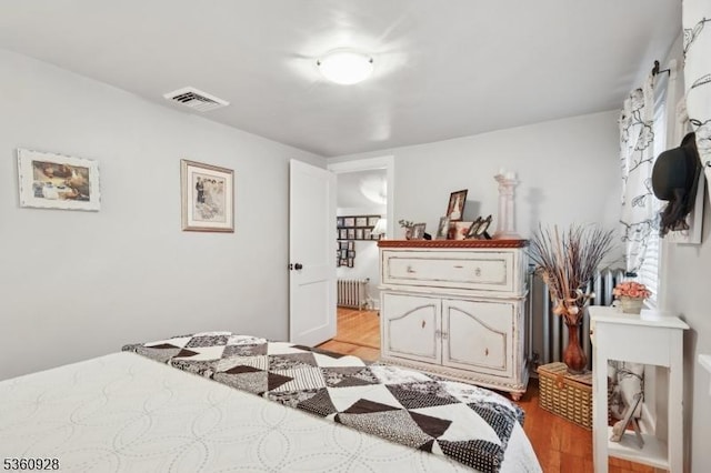 2 Broad St, Stockton Boro, NJ 08559 - bedroom with radiator and light wood-style flooring