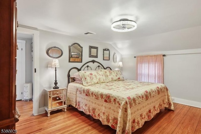 2 Broad St, Stockton Boro, NJ 08559 - bedroom with light wood-style flooring, baseboards, and vaulted ceiling