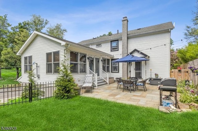 2 Broad St, Stockton Boro, NJ 08559 - rear view of house featuring entry steps, a patio, and a chimney