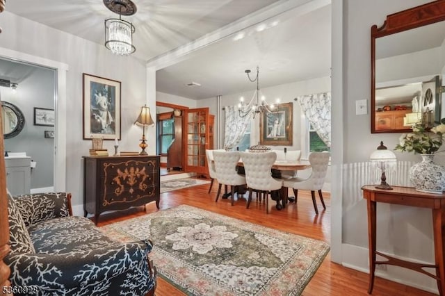 2 Broad St, Stockton Boro, NJ 08559 - living area featuring a chandelier and wood finished floors