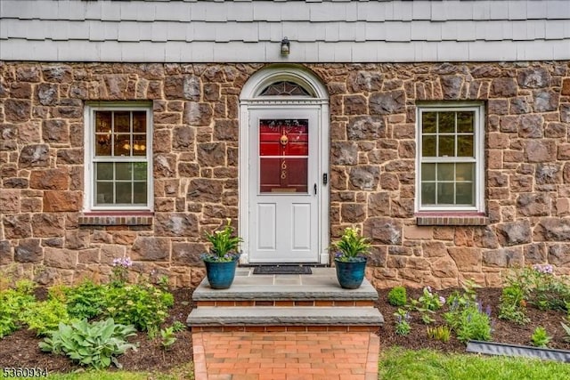 168 Grove St, Montclair Twp, NJ 07042 - doorway to property with stone siding