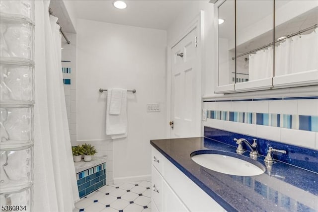 168 Grove St, Montclair Twp, NJ 07042 - full bath with vanity, tasteful backsplash, a shower with shower curtain, and recessed lighting