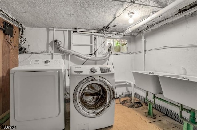 168 Grove St, Montclair Twp, NJ 07042 - washroom with washer and dryer and tile patterned floors