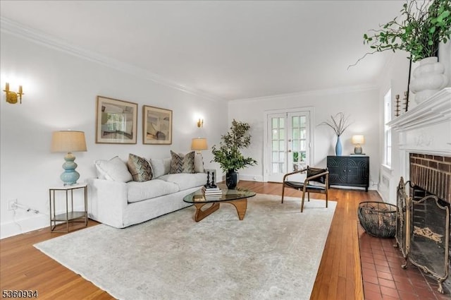 168 Grove St, Montclair Twp, NJ 07042 - living area with ornamental molding, a fireplace, wood finished floors, and baseboards