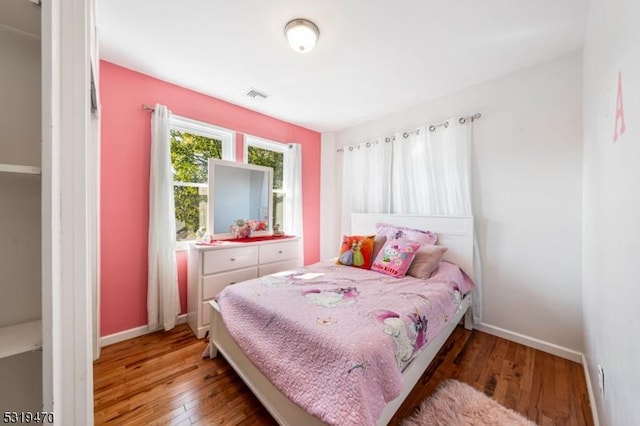 770 Stone St, Rahway City, NJ 07065 - bedroom with light wood-style flooring and baseboards