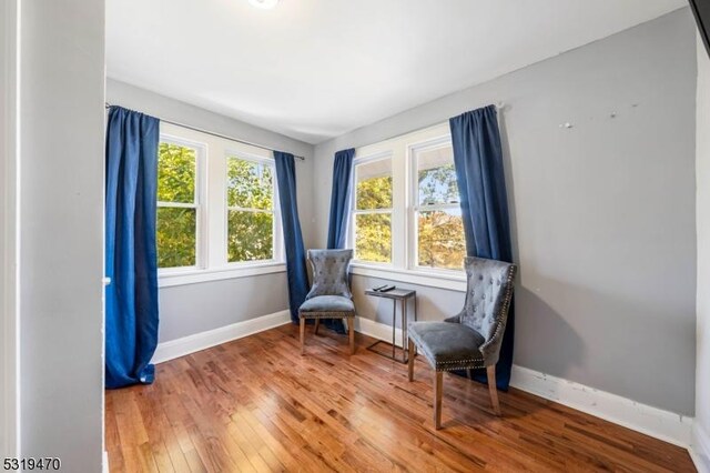 770 Stone St, Rahway City, NJ 07065 - living area with hardwood / wood-style floors and baseboards