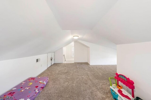 770 Stone St, Rahway City, NJ 07065 - game room featuring light colored carpet and vaulted ceiling