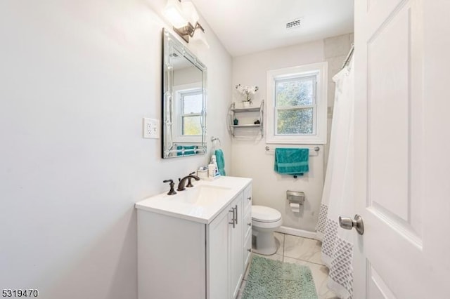 770 Stone St, Rahway City, NJ 07065 - full bath with vanity, toilet, marble look tiles, and curtained shower