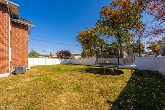 770 Stone St, Rahway City, NJ 07065 - view of yard with a trampoline and central AC