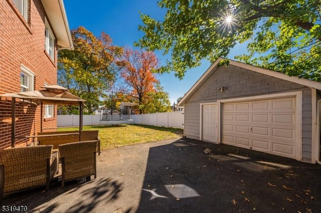 770 Stone St, Rahway City, NJ 07065 - view of yard featuring a detached garage and an outdoor structure
