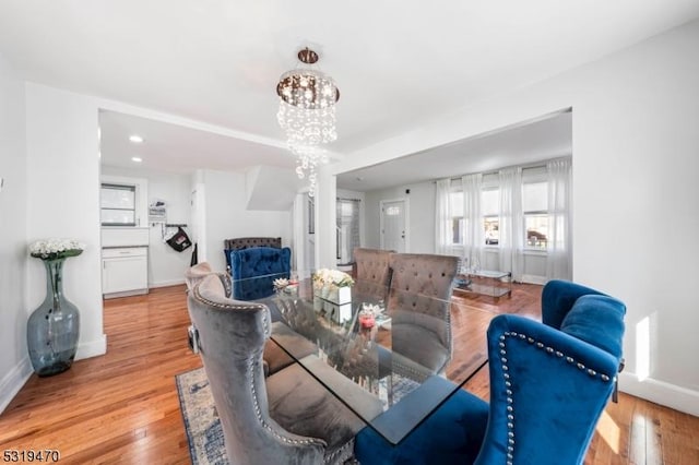 770 Stone St, Rahway City, NJ 07065 - dining area featuring baseboards, a chandelier, wood finished floors, and recessed lighting