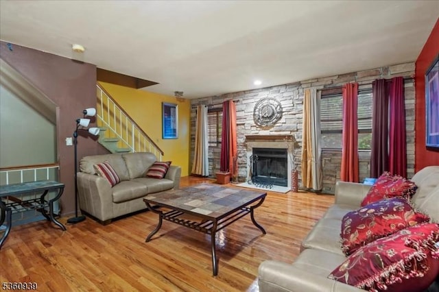 804 Orchard Meadows Dr, Union Twp, NJ 07083 - living area featuring wood finished floors, a stone fireplace, and stairs