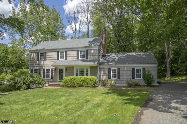 3 Rolling Hill Dr, Morris Twp, NJ 07960 - colonial house with a chimney and a front lawn