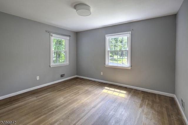 3 Rolling Hill Dr, Morris Twp, NJ 07960 - empty room featuring baseboards and wood finished floors