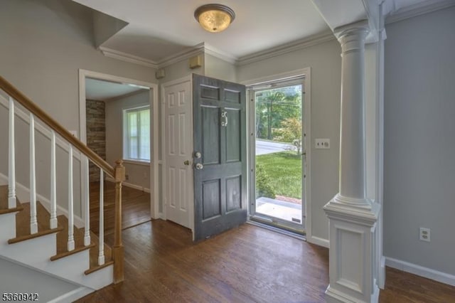 3 Rolling Hill Dr, Morris Twp, NJ 07960 - foyer entrance with ornate columns, wood finished floors, stairs, baseboards, and ornamental molding