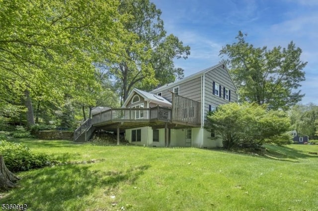 3 Rolling Hill Dr, Morris Twp, NJ 07960 - rear view of house featuring a deck, a lawn, and stairs