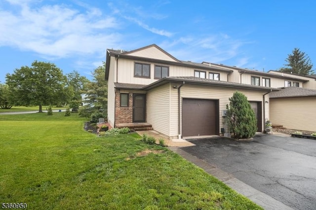 31 Canterberry Cir, Raritan Twp, NJ 08822 - view of front of property featuring asphalt driveway, a front lawn, a garage, and board and batten siding