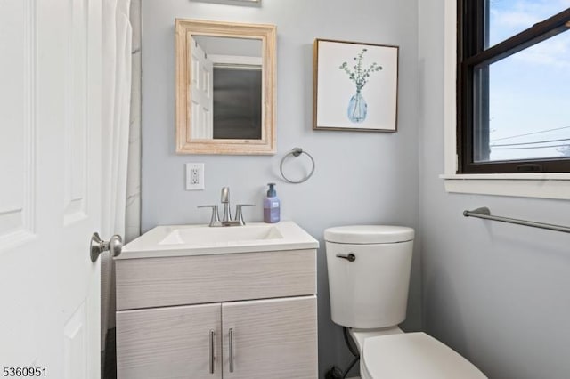 55 Jefferson St, Clifton City, NJ 07014 - bathroom with toilet, vanity, and plenty of natural light