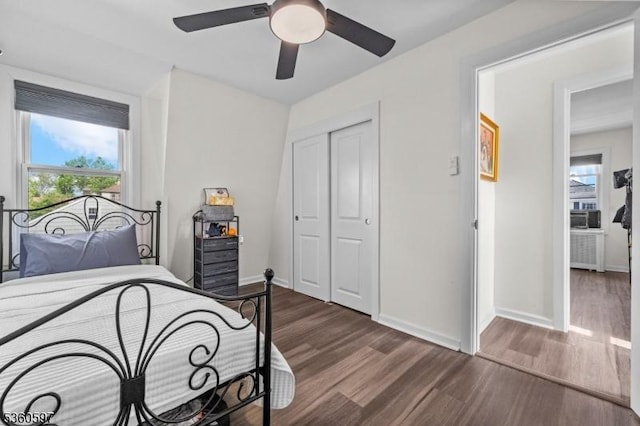 24-09 Raphael St, Fair Lawn Boro, NJ 07410 - bedroom featuring dark wood-style floors, a closet, baseboards, and a ceiling fan