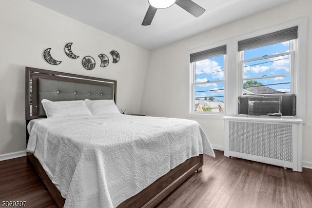 24-09 Raphael St, Fair Lawn Boro, NJ 07410 - bedroom with radiator heating unit, baseboards, wood finished floors, and cooling unit