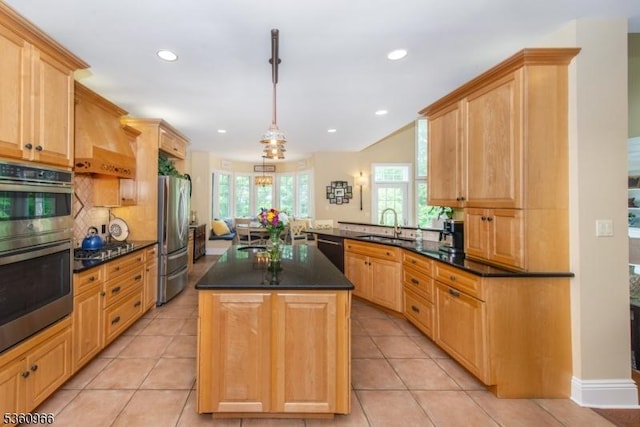 7 Briscoe Chase, Ringwood Boro, NJ 07456 - kitchen with appliances with stainless steel finishes, recessed lighting, a peninsula, a kitchen island, and decorative light fixtures