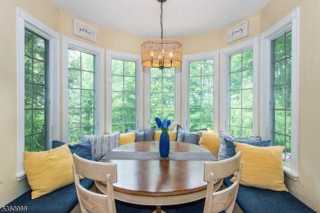 7 Briscoe Chase, Ringwood Boro, NJ 07456 - sunroom with french doors, healthy amount of natural light, and a chandelier