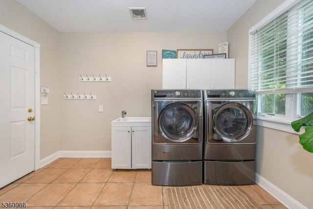 7 Briscoe Chase, Ringwood Boro, NJ 07456 - laundry area featuring cabinet space, washer and dryer, baseboards, and light tile patterned floors