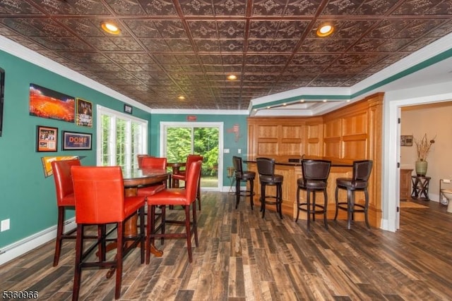 7 Briscoe Chase, Ringwood Boro, NJ 07456 - dining room with ornamental molding, an ornate ceiling, baseboards, wood finished floors, and a baseboard radiator