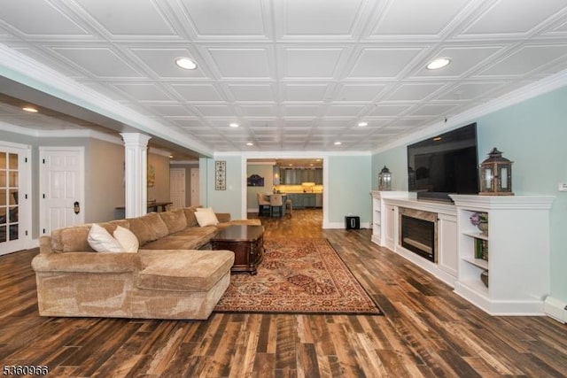 7 Briscoe Chase, Ringwood Boro, NJ 07456 - living area featuring recessed lighting, dark wood finished floors, a fireplace, baseboards, and ornate columns