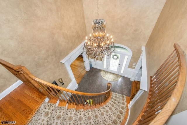 7 Briscoe Chase, Ringwood Boro, NJ 07456 - foyer featuring a high ceiling, a chandelier, french doors, and a decorative wall